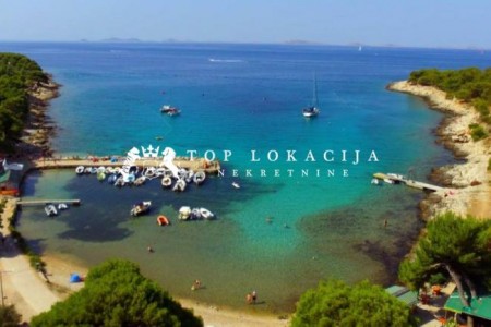 TOP GRAĐEVINSKO ZEMLJIŠTE- OTOK MURTER UVALA ČIGRAĐA - JEDINSTVENA EKSKLUZIVNA LOKACIJA